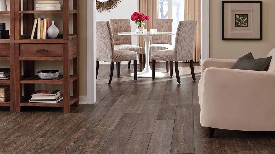 Laminate wood flooring in dining room and living room