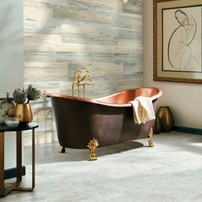 tile flooring in an elegant bathroom with copper tub